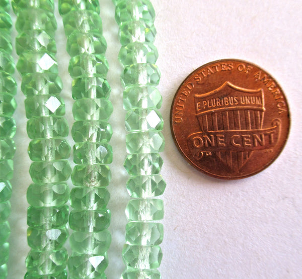 Fifty 6 x 3mm Czech glass faceted rondelle beads - transparent mint or peridot green spacers or rondelles C0037