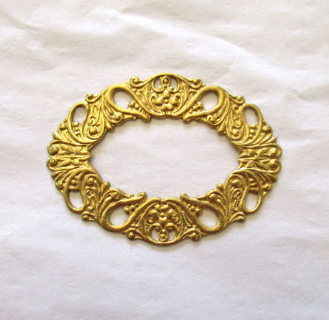 1 raw brass stamping - ornate oval wreath - connector ring - ornament - 55 x 42 mm - made in the USA C0078