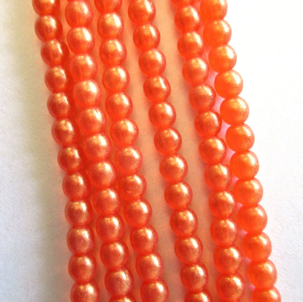 100 4mm Czech glass druks - Sueded Gold Hyacinth - bright orange tangerine, smooth round druk beads with a gold finish C0055