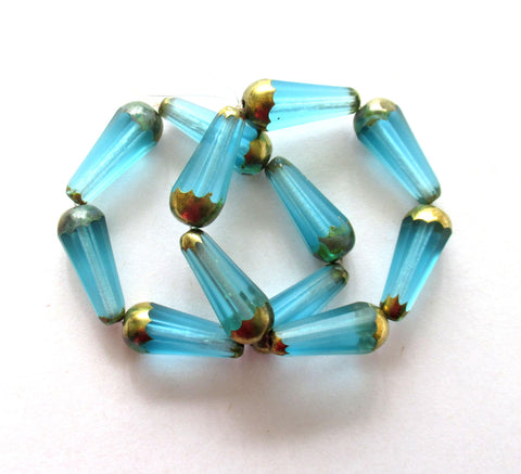 Six Czech glass long faceted teardrop beads - transparent aqua blue w/ bronze accents - 9 x 20mm tear drop 00362