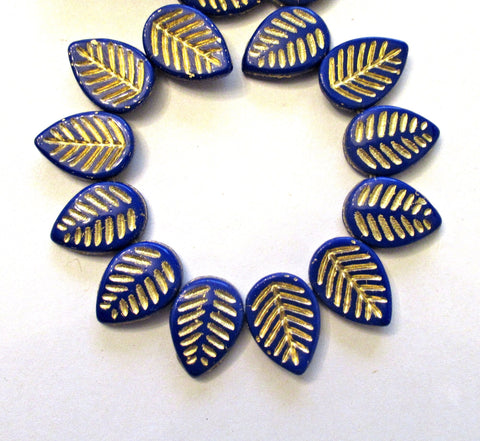 Ten large Czech glass leaf beads - side drilled - opaque royal blue beads with a gold wash - 12 x 16mm carved beads C00041