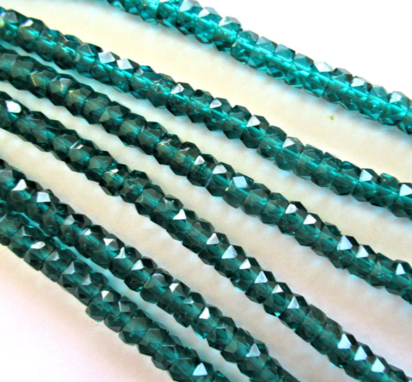 50 6 x 3mm Czech glass faceted rondelle beads - transparent emerald green / teal spacers or rondelles C0037