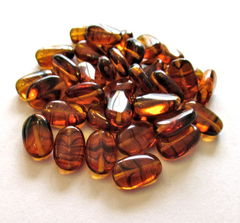 Lot of 15 slightly twisted oval Czech glass beads - 14mm x 8mm tortoise - tortoiseshell - pressed glass beads C0089