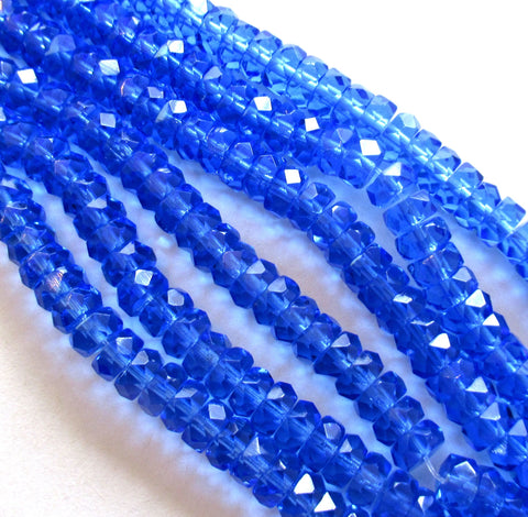 Lot of 50 6 x 3mm Czech glass faceted rondelle beads - transparent sapphire blue spacers or rondelles C0087