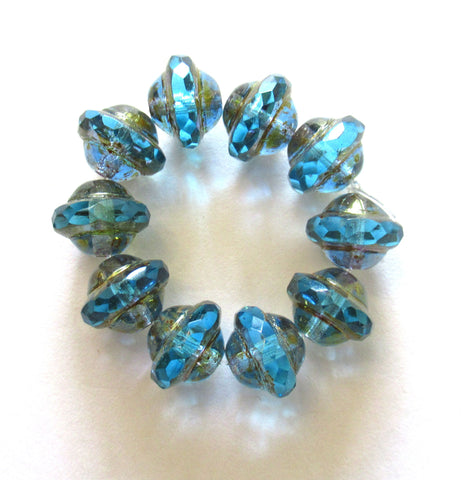 Ten Czech glass saturn or sauceer beads - 8mm x 10mm transparent aqua blue faceted beads with a bronze finish - C00141