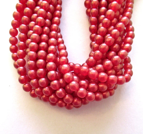 Fifty 6mm Czech glass druk beads - Cosmic Twinkle Siam Ruby Red smooth round druks - C0009