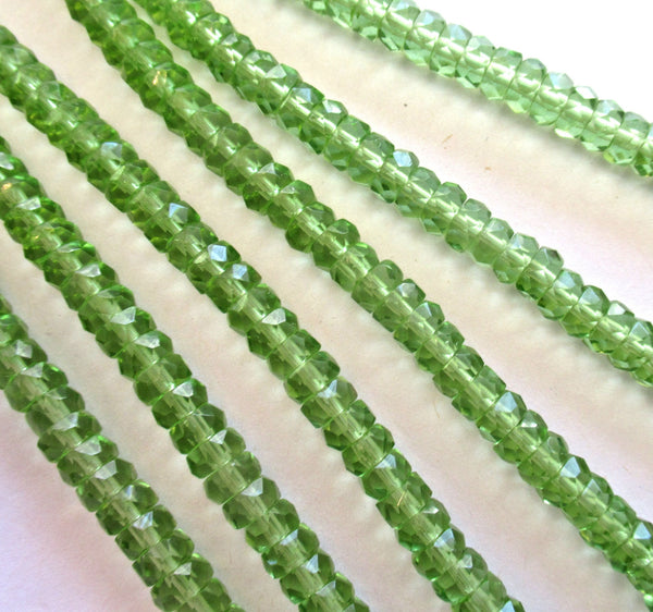 Fifty 6 x 3mm Czech glass faceted rondelle beads - transparent olivine green spacers or rondelles C0037