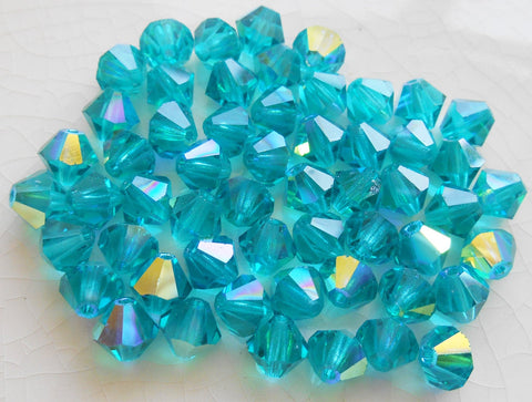 Lot of 24 6mm Blue Zircon AB AB Czech Preciosa Crystal bicone beads, faceted glass blue AB bicones C60101