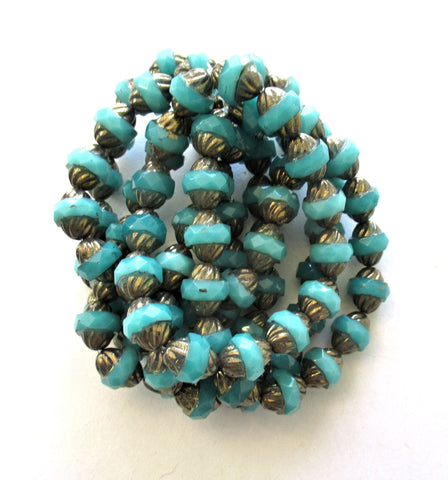 Ten Czech glass turbine beads - 11 x 10mm light translucent milky blue green faceted saucer beads with a bronze finish on the ends - C00652