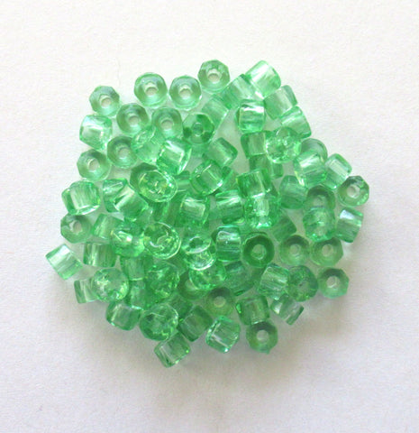 Fifty 6mm faceted mint green Czech glass pony roller beads - large hole crow beads - C00831