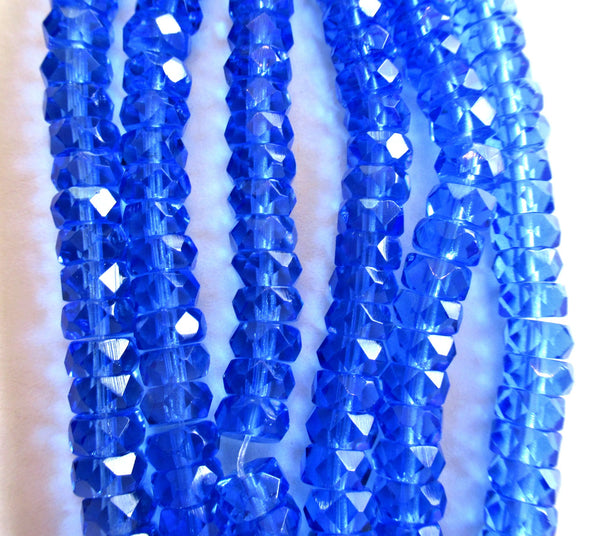 Lot of 50 6 x 3mm Czech glass faceted rondelle beads - transparent sapphire blue spacers or rondelles C0087