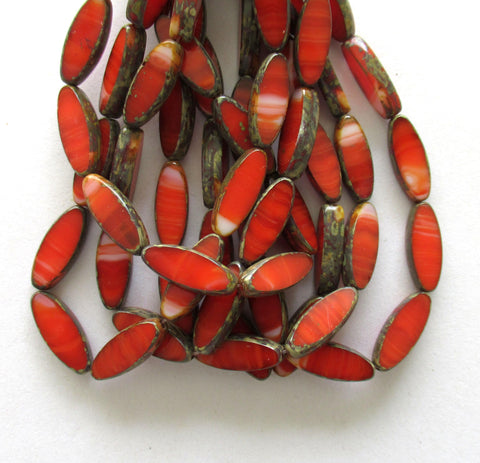 Twelve Czech glass spindle beads - 16 x 6mm - opaque marbled red & white picasso - table cut - almond shaped beads C00641