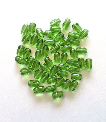 25 Czech glass beads - 9mm x 6mm olivine green glass twisted oval beads C0062