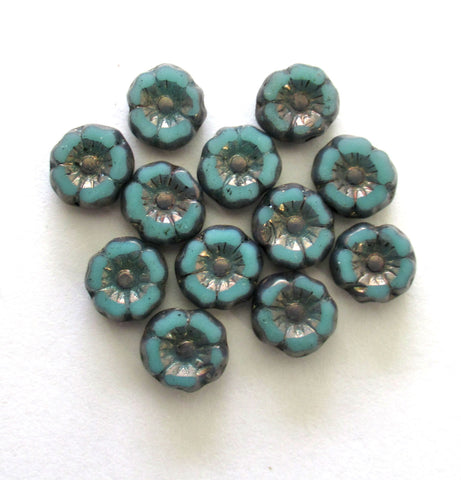 12 small Czech glass flower beads - 7mm opaque turquoise blue Hawaiian flowers w/ bronze picasso accents - table cut, carved beads C00911