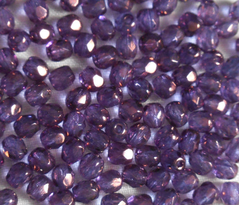 Lot of 50 4mm Lumi Amethyst beads, iridescent purple round faceted firepolished Czech glass beads, C1450 - Glorious Glass Beads